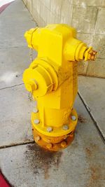 High angle view of fire hydrant on sidewalk