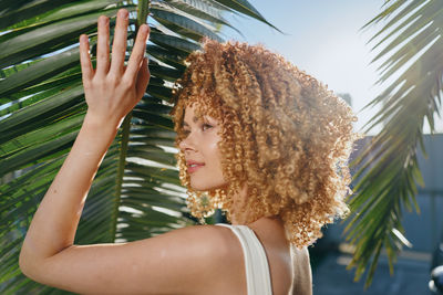Portrait of young woman with eyes closed