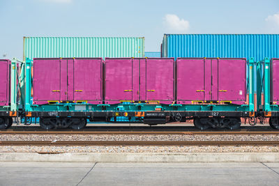 Train on railroad track against sky