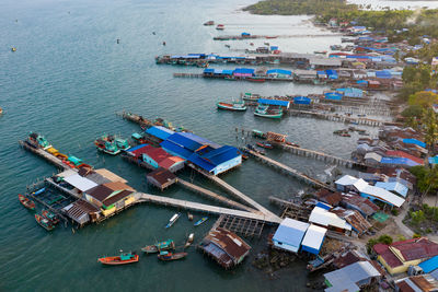 High angle view of boats moored at harbor