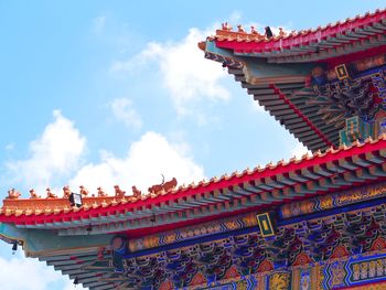 Low angle view of temple building against sky