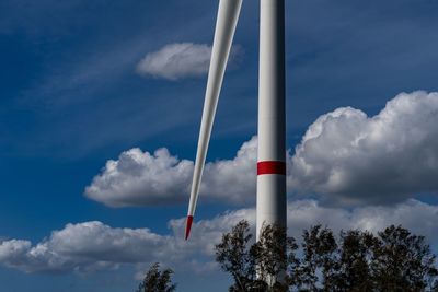 Low angle view of pole against blue sky