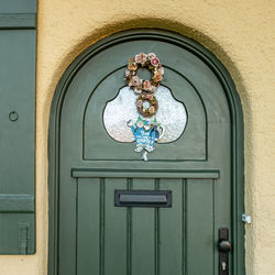 Closed door of building in cottage style