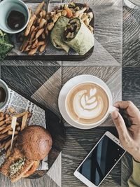 High angle view of coffee cup on table