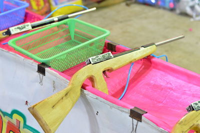 Wooden rifles on table