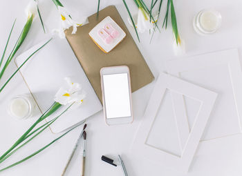 High angle view of text on white table