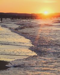 Scenic view of beach during sunset