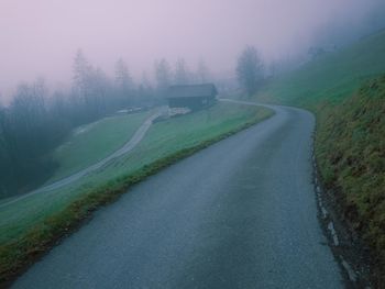 Road passing through field