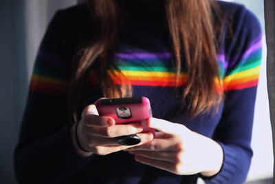 Close-up of man using mobile phone