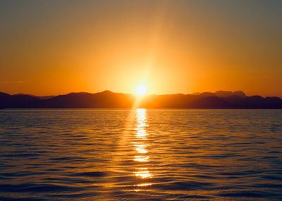 Scenic view of sea against sky during sunset