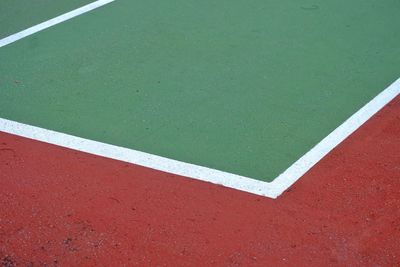 High angle view of arrow sign on field