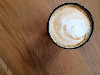 Directly above shot of coffee cup on table