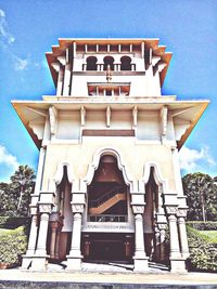 Low angle view of building against blue sky