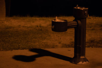 Fire hydrant on road at night