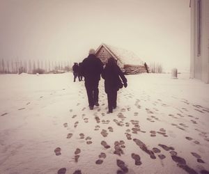 Full length of woman standing on railing
