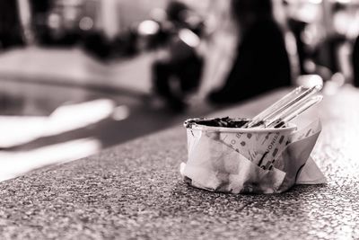 Close-up of ice cream on street