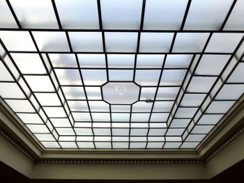 Low angle view of skylight in building