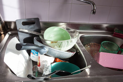 People in kitchen counter at home