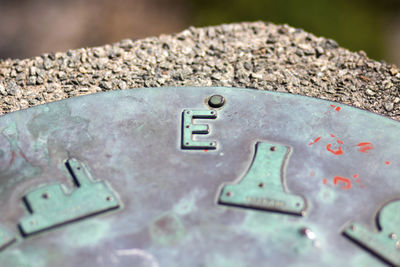 Close-up of text on metal