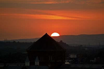 Scenic view of mountains at sunset