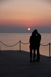 Scenic view of sea at sunset