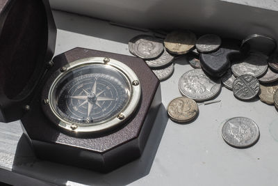 High angle view of clock on table