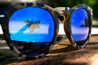 Close-up of sunglasses on table