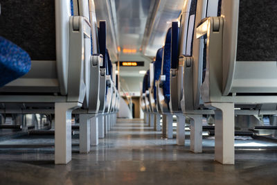 Low section of empty seats in corridor