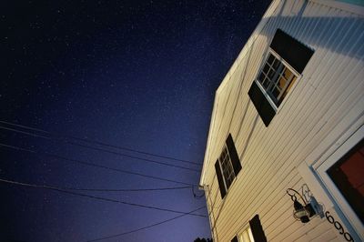 Low angle view of built structure at night