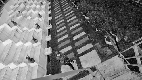 High angle view of people walking on street in city