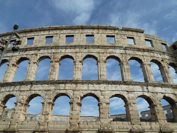 Low angle view of historical building against sky