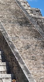 Low angle view of brick wall