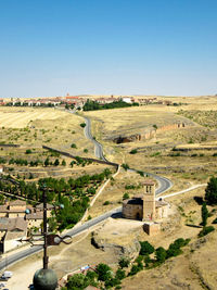 High angle view of road against clear blue sky