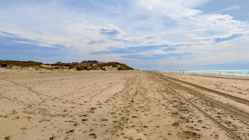 Scenic view of beach against sky