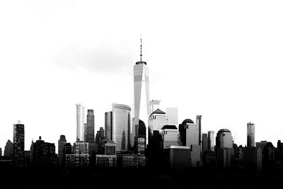 Modern buildings in city against sky