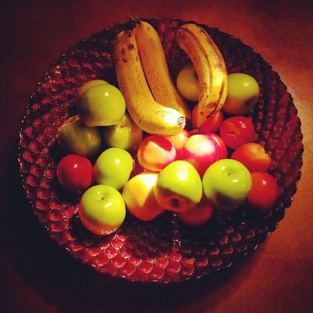 food and drink, food, indoors, freshness, still life, healthy eating, fruit, table, high angle view, multi colored, close-up, sweet food, yellow, directly above, no people, variation, vegetable, pumpkin, large group of objects, red