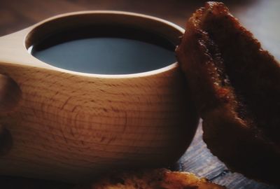 Close-up of coffee cup on table