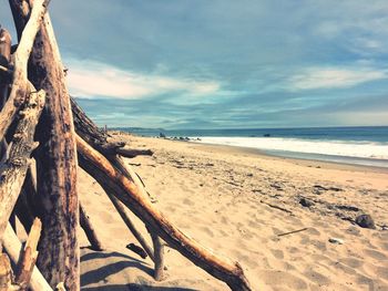 Scenic view of beach against sky