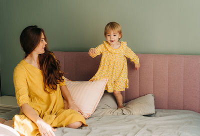 Mother and daughter at home