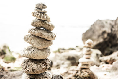 Close-up of stone stack on rock