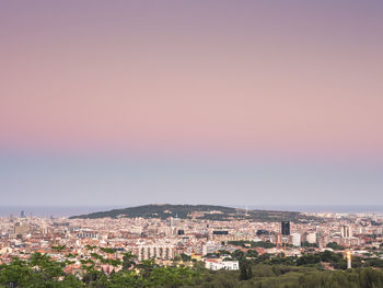 High angle view of townscape against sky at sunset