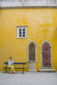 Man with yellow umbrella