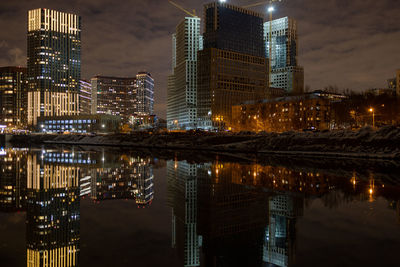 Illuminated buildings in city at night