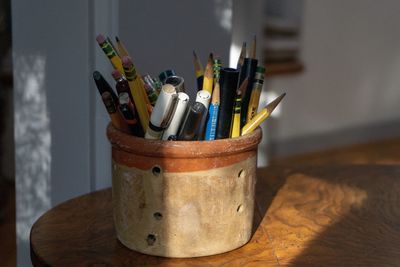 Close-up of colored pencils on table