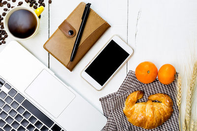 High angle view of orange juice on table