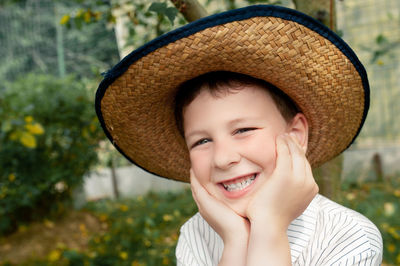 Portrait of smiling boy wearing hat