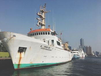 Ship in sea against clear sky