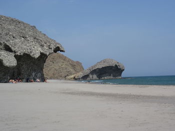 Scenic view of beach against clear sky