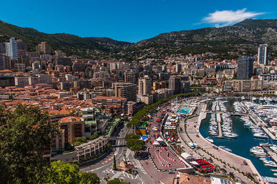 High angle view of illuminated city against sky