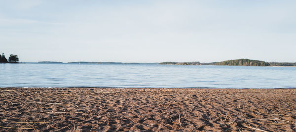 Scenic view of beach against sky